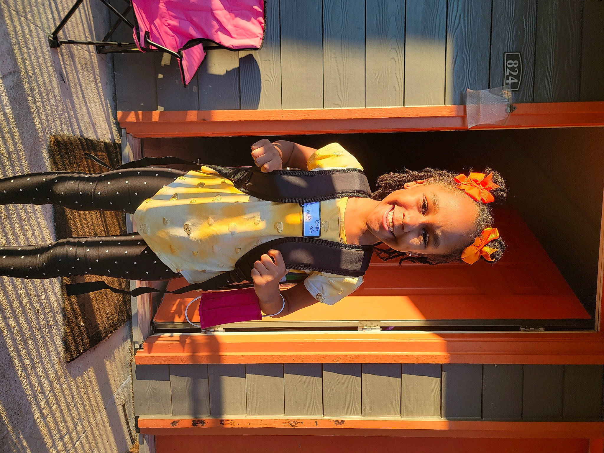 Aaliyah joined the competition — help win amazing prizes! fashion_design, fun, human_body, joy, orange, person, room, wood