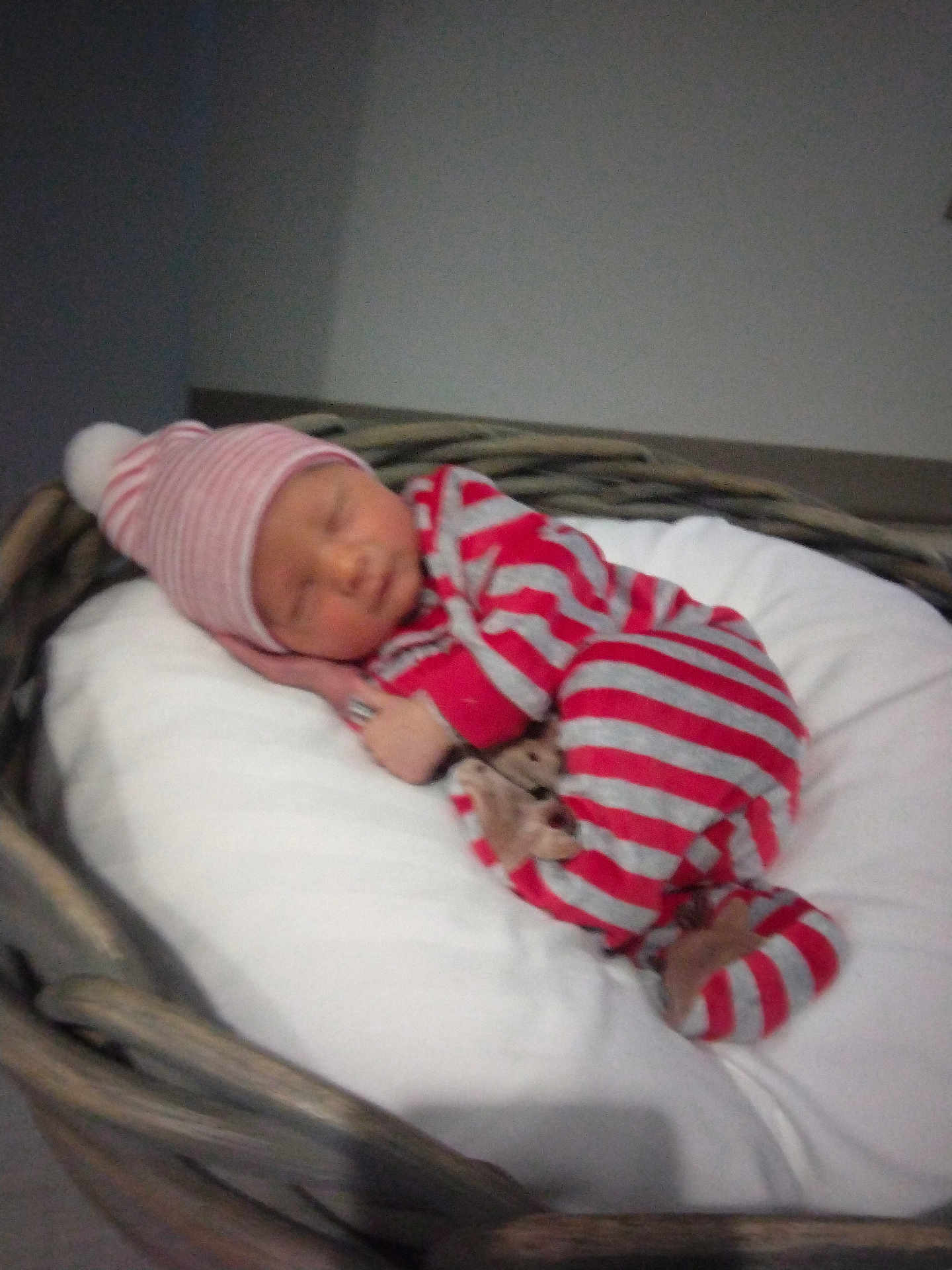 Ethan joined the competition — help win amazing prizes! baby, sleeping, basket, pajamas, hat, plush_toy, cushion, bed, infant, striped_clothing, cozy, rest, newborn, indoor, cute, child, peaceful, soft, wearing_hat, person