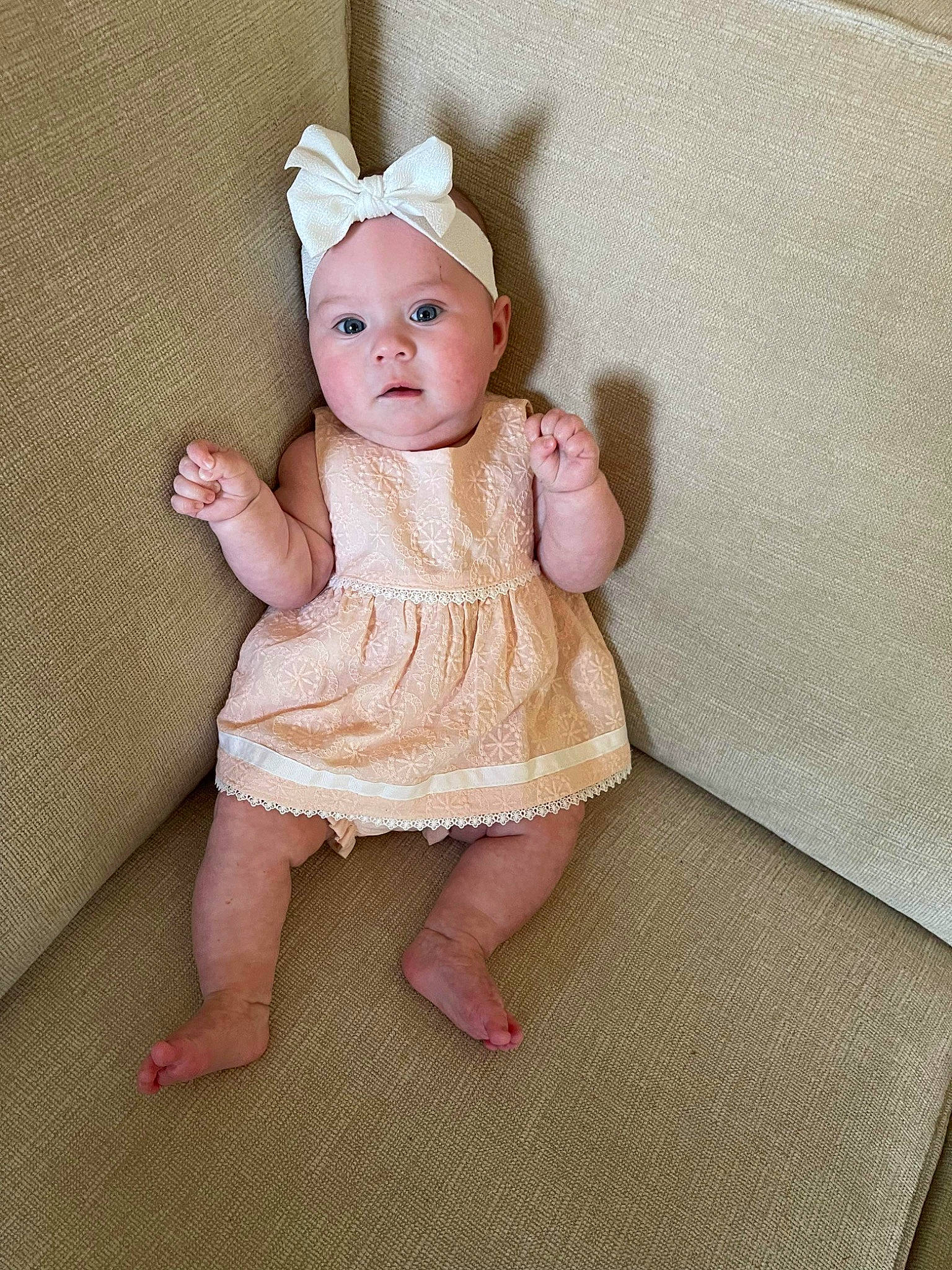 Gabriela is registered to the contest to win money with this photo: baby, baby_toddler_clothing, cheek, child, doll, dress, embellishment, eye, eyelash, fashion_accessory, fawn, finger, head, headwear, iris, pattern, peach, person, pink, skin