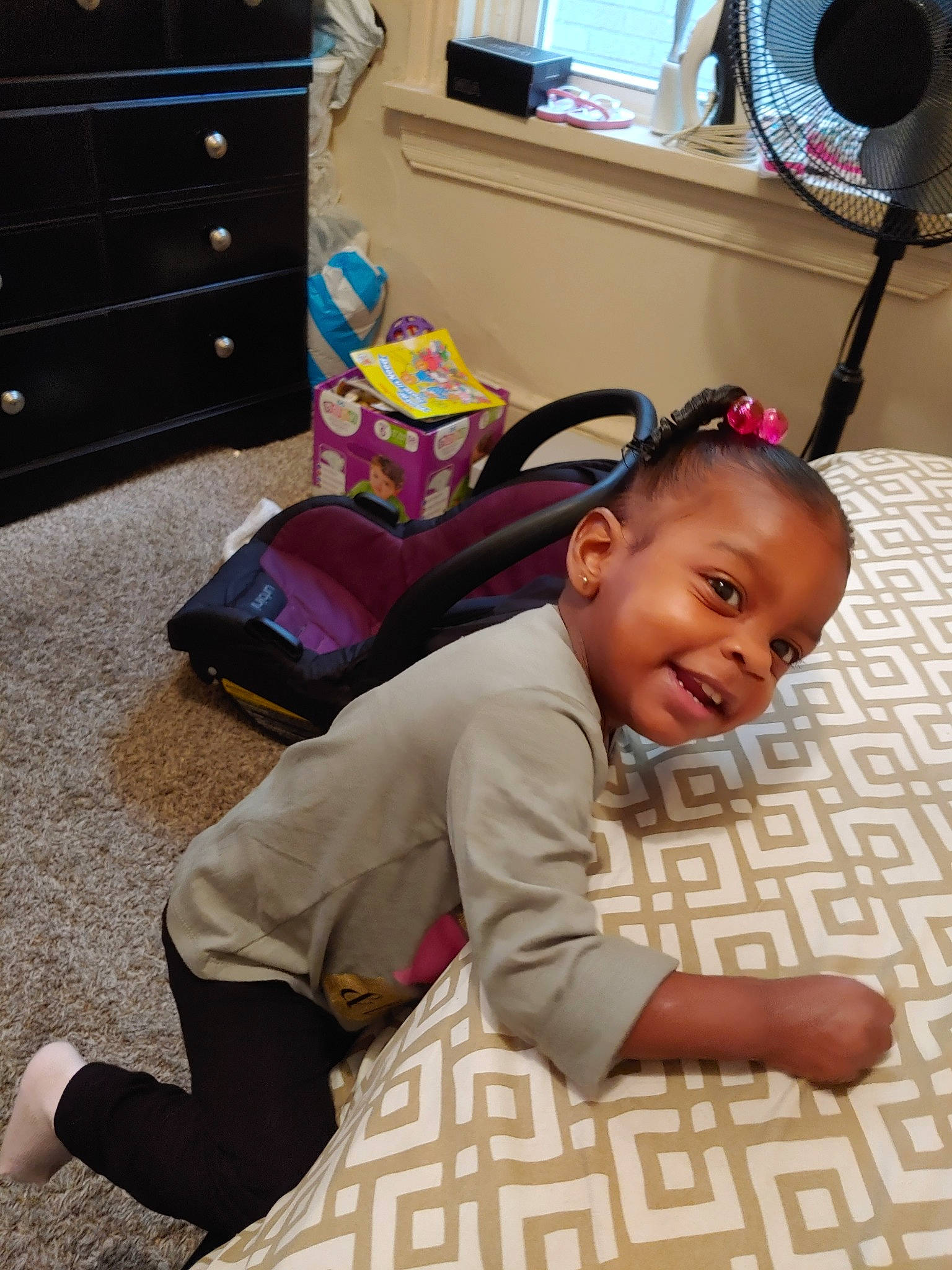 Honesty is registered to the contest to win money with this photo: baby, child, ear, electronic_device, floor, flooring, person, play, room, sitting, technology, toddler