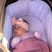 Ocean joined the competition — help win amazing prizes! baby, infant, newborn, stroller, bassinet, headband, bow, blanket, pink, mittens, portrait, cute, canopy, cozy, fabric, sleepwear, face, soft, resting, indoors
