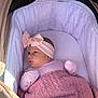 baby, infant, newborn, stroller, bassinet, headband, bow, blanket, pink, mittens, portrait, cute, canopy, cozy, fabric, sleepwear, face, soft, resting, indoors