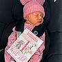 newborn, baby, sleeping, pink, hat, pom_poms, car_seat, milestone_card, infant, clothing, cute, child, portrait, soft, cozy, baby_girl, face, person, resting, close_up
