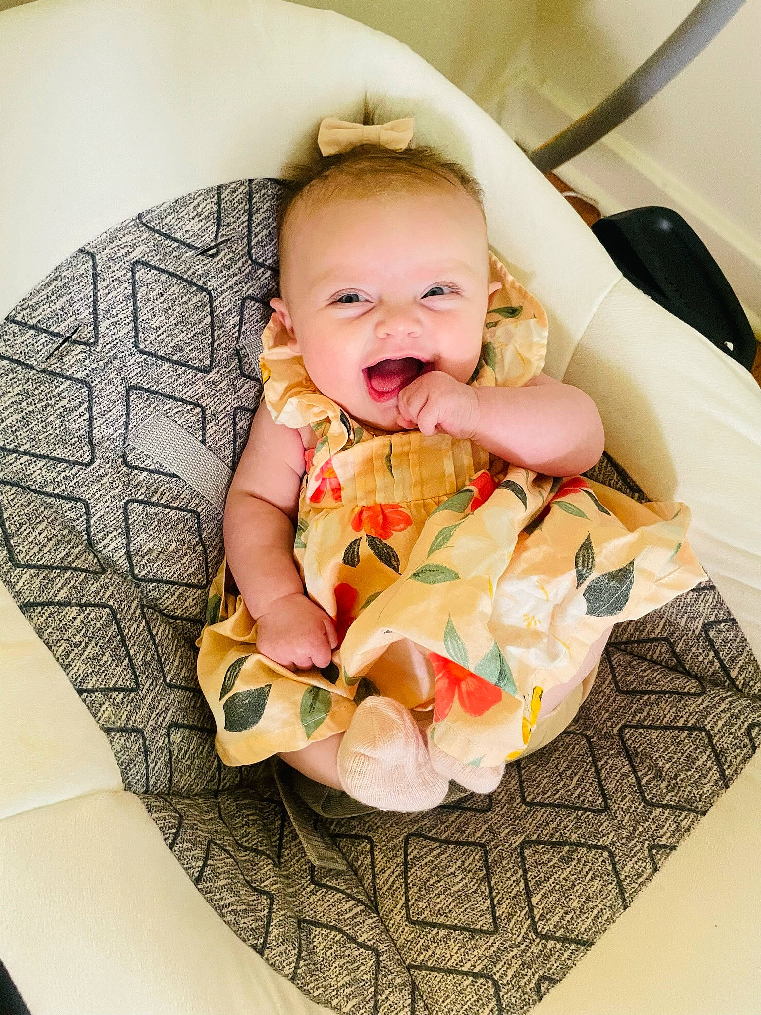 Lilyana is registered to the contest to win money with this photo: baby, baby_products, baby_toddler_clothing, chair, cheek, child, circle, comfort, happy, head, human_body, linens, mouth, pattern, person, product, room, sitting, smile, textile