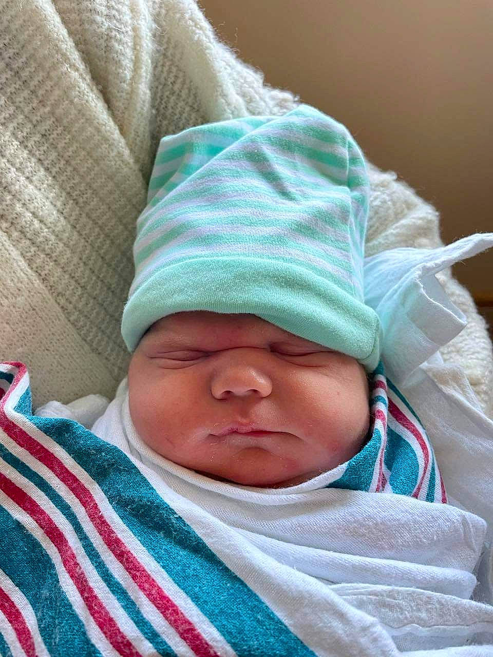 Braylyn joined the competition — help win amazing prizes! azure, baby, baby_products, baby_sleeping, baby_toddler_clothing, bedding, child, comfort, headgear, headwear, linens, nap, person, skin, sleep, sleeve, textile, thumb, toddler, wool