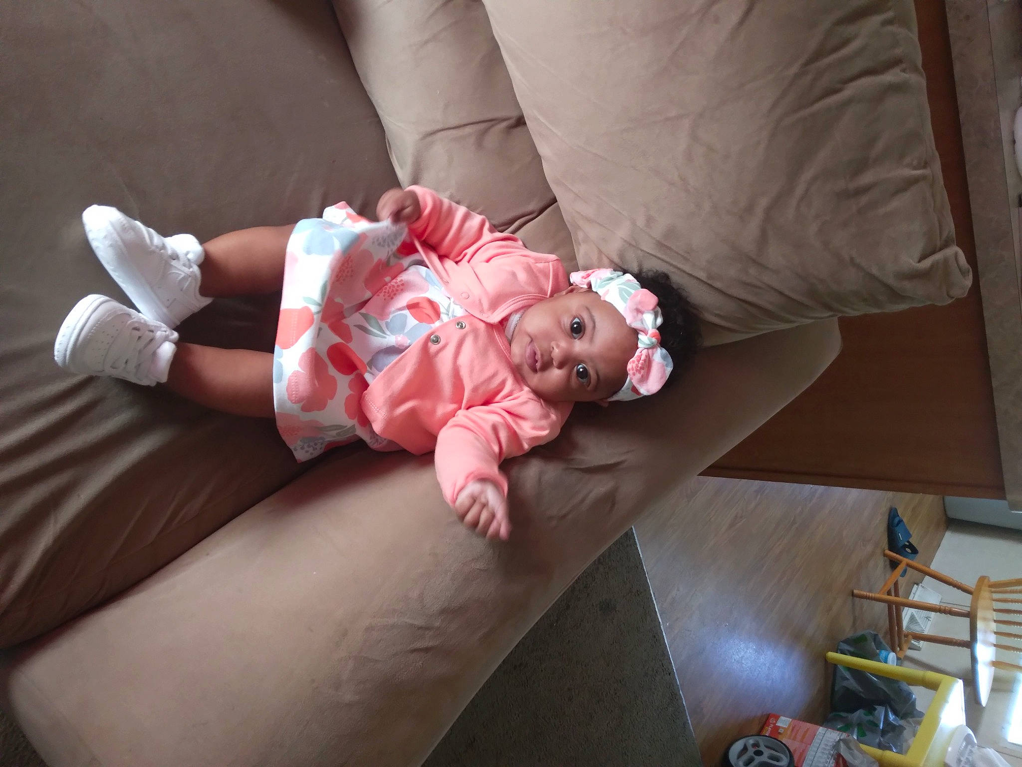 Jalia is registered to the contest to win money with this photo: baby, baby_toddler_clothing, carmine, child, comfort, couch, flash_photography, flooring, foot, hardwood, headwear, human_leg, knee, linens, nap, person, room, sitting, sock, thigh