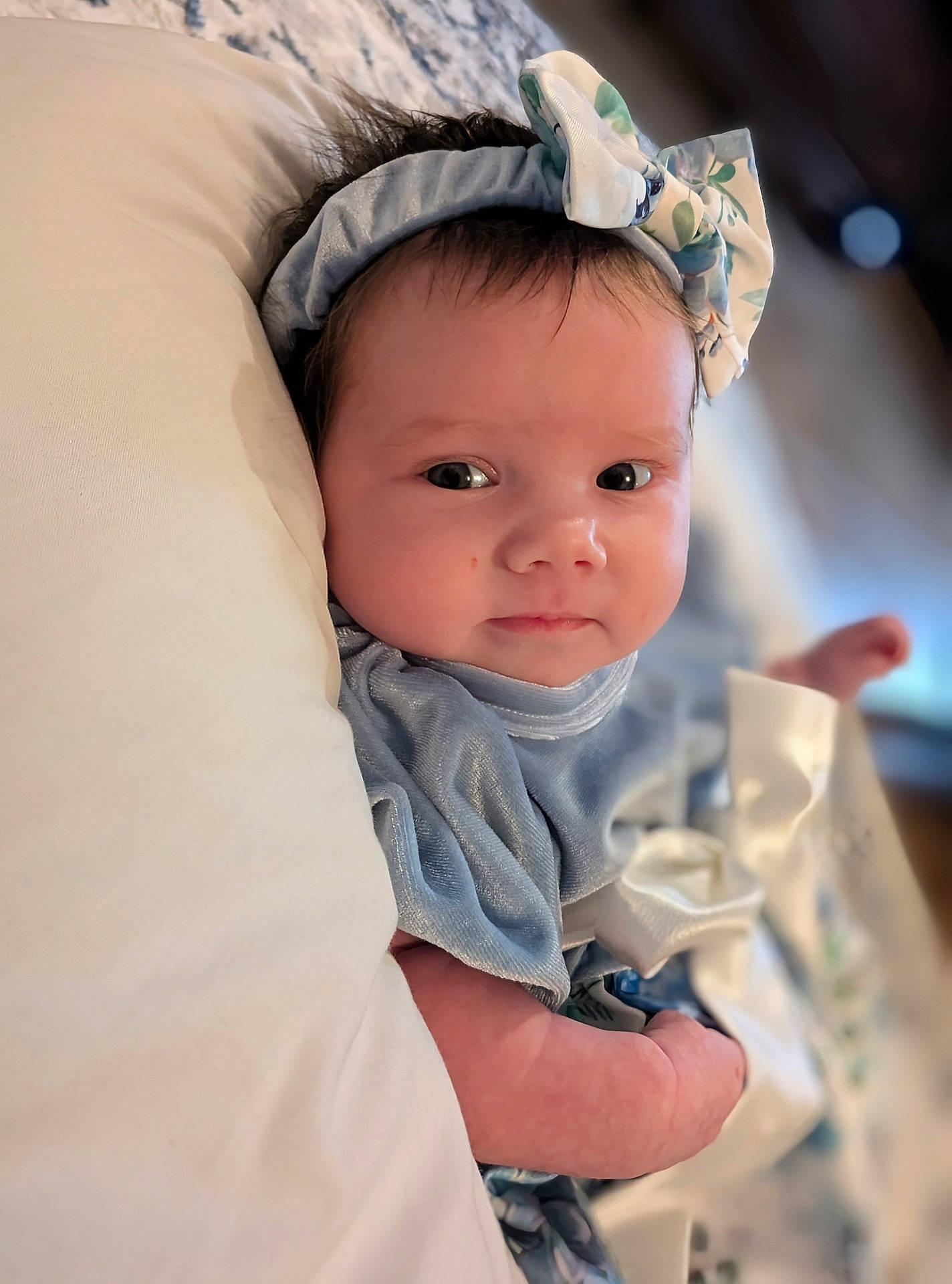 baby, bed, blanket, bodypart, bonnet, cap, clothing, couch, face, finger, furniture, hand, happy, hat, head, newborn, person, photography, portrait, smile
