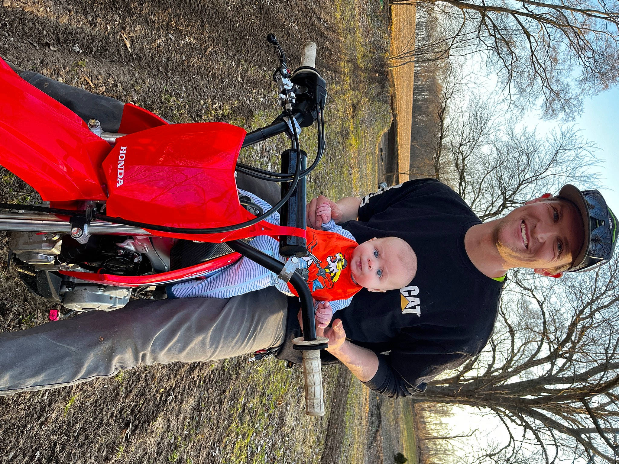 Ozzy joined the competition — help win amazing prizes! adventure, automotive_exterior, baby_products, boot, carmine, fun, grass, happy, hat, headwear, helmet, joy, leisure, person, personal_protective_equipment, recreation, sky, smile, sneakers, tire