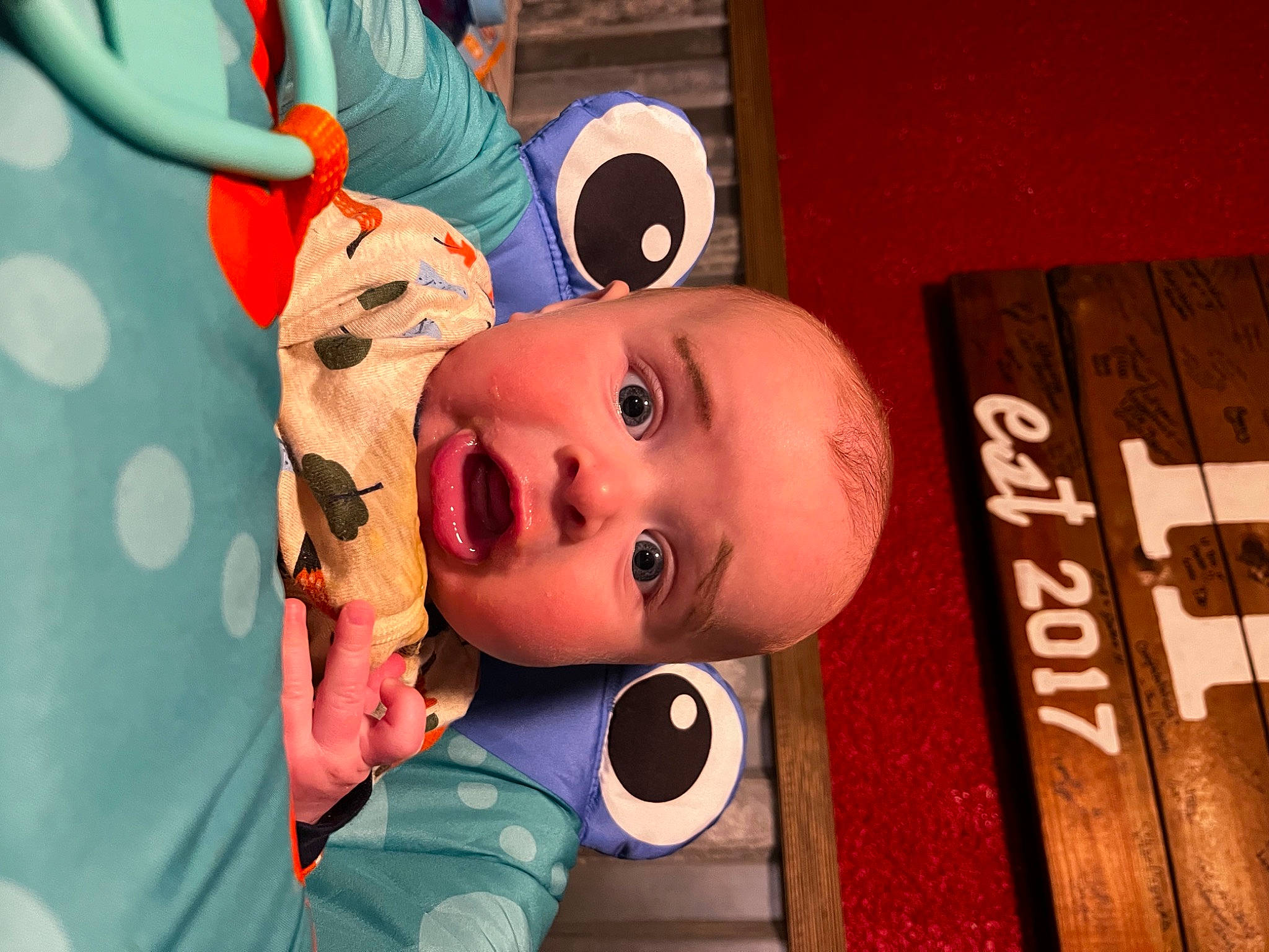 Ozzy is registered to the contest to win money with this photo: animation, art, baby, box, cheek, child, eyelash, fashion_accessory, fun, happy, hat, headgear, leisure, nose, orange, person, play, room, toddler, toy