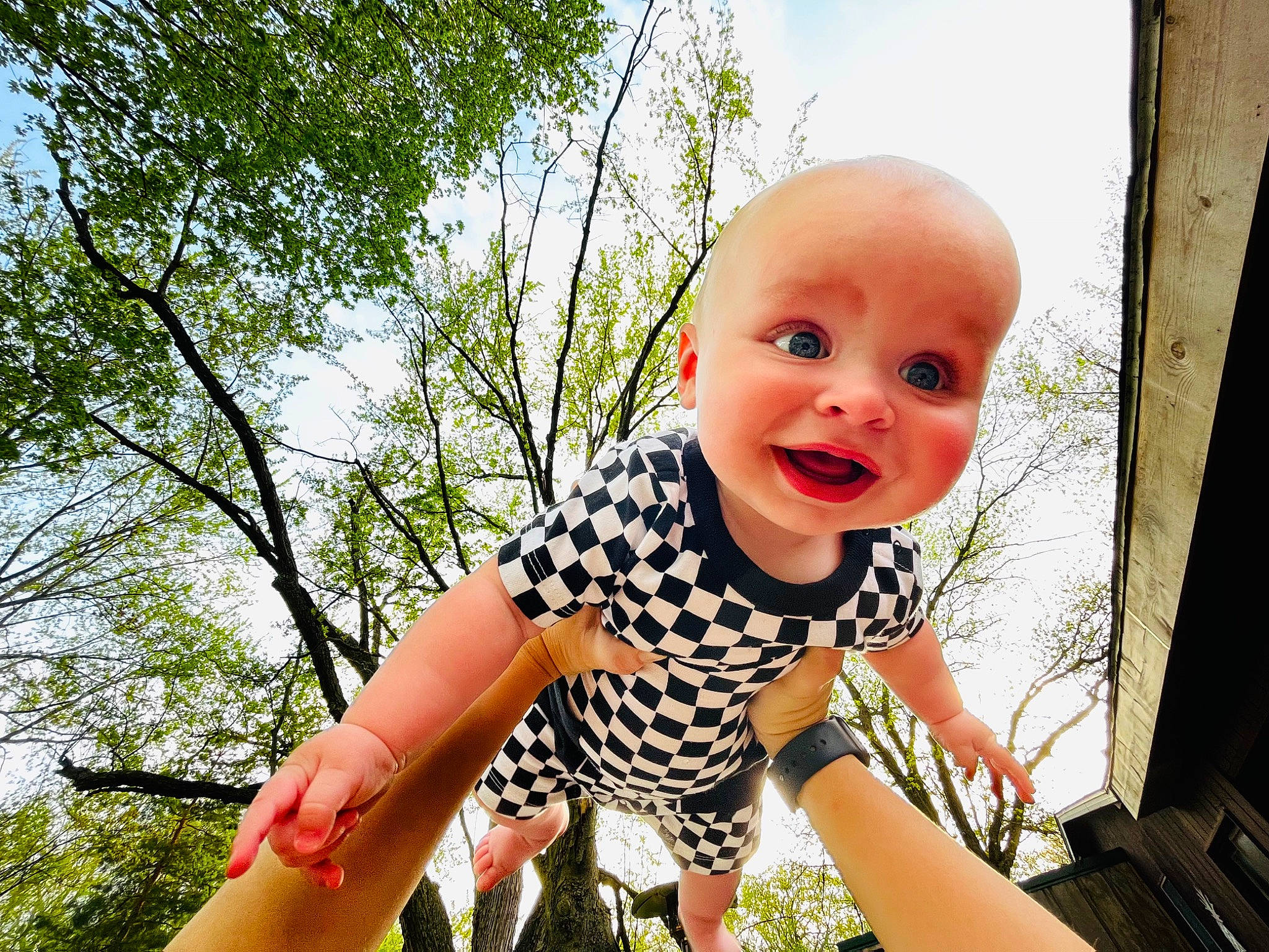 Ozzy joined the competition — help win amazing prizes! baby, baby_toddler_clothing, child, facial_expression, finger, fun, grass, happy, human_leg, leisure, pattern, people_in_nature, person, recreation, sitting, sky, sleeve, smile, t_shirt, toddler