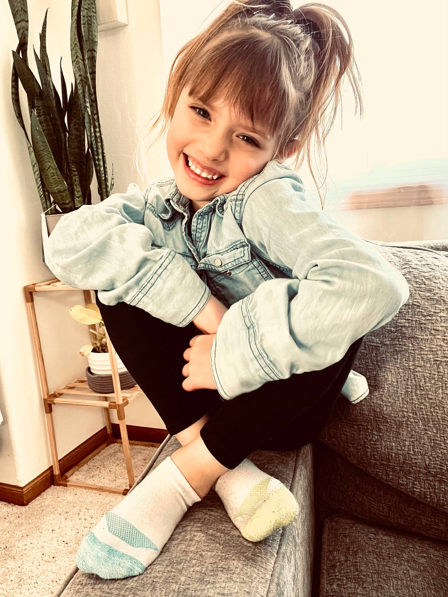 Arizona is registered to the contest to win money with this photo: beauty, black_hair, chair, comfort, eye, face, flash_photography, hair, hairstyle, happy, human_body, joint, joy, knee, leg, long_hair, neck, person, shoulder, sleeve