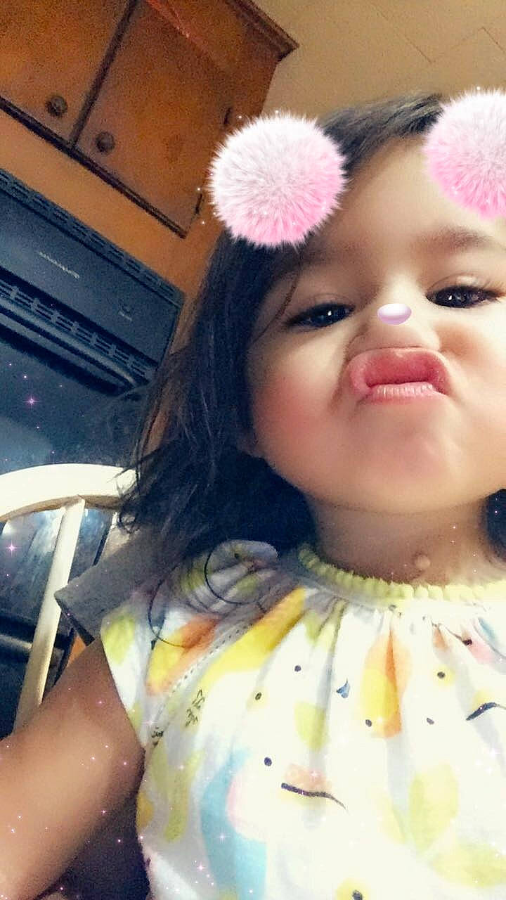 Emery is registered to the contest to win money with this photo: beauty, brown_hair, cheek, child, child_model, ear, eye, eyelash, face, fashion_accessory, hair_accessory, head, headband, headgear, lip, nose, person, pink, skin, smile