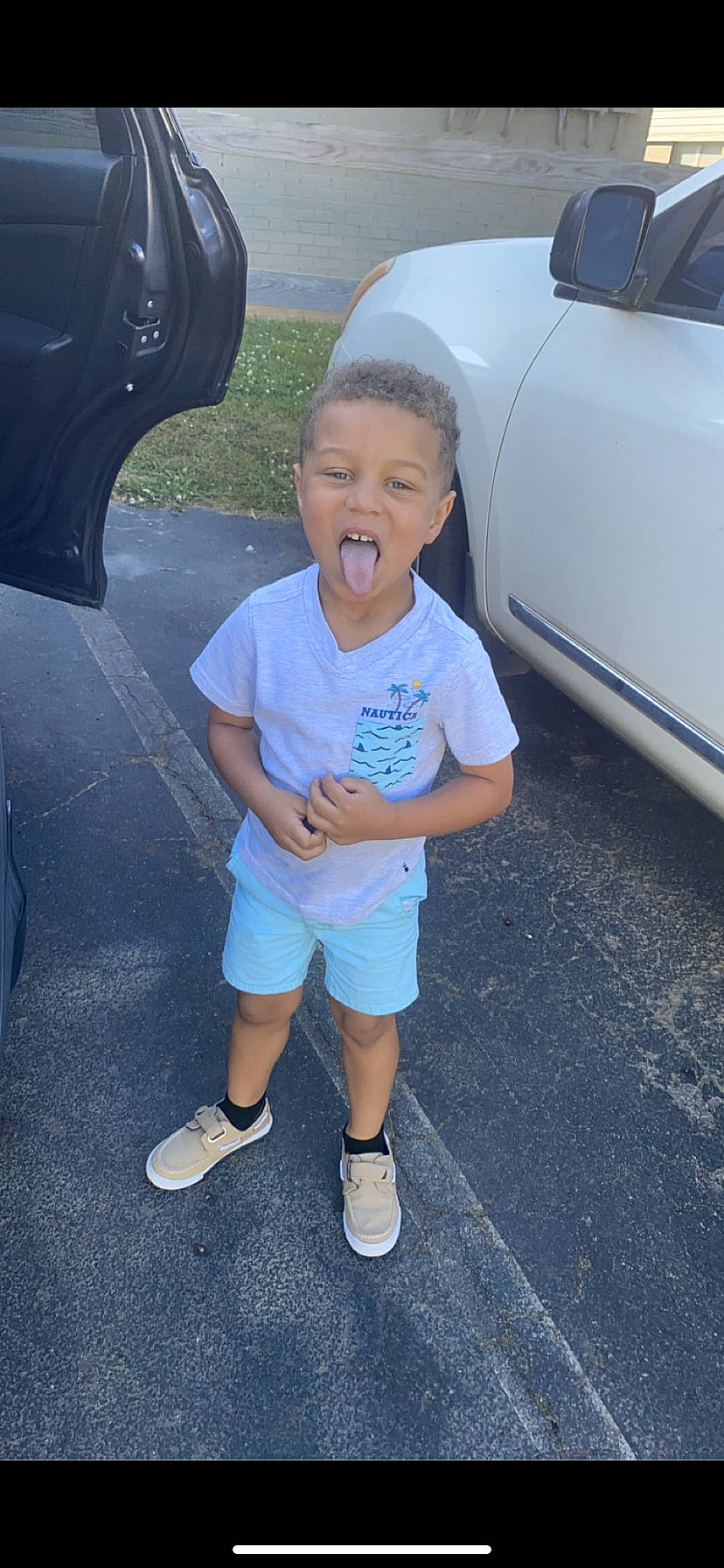 Jason joined the competition — help win amazing prizes! asphalt, auto_part, automotive_design, automotive_exterior, automotive_lighting, automotive_tire, baby_toddler_clothing, bumper, car, fender, hood, light, mammal, motor_vehicle, person, product, shorts, tire, toddler, vehicle