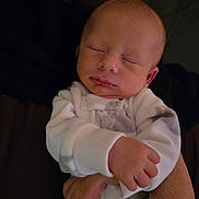 Baker joined the competition — help win amazing prizes! baby, newborn, sleeping, infant, onesie, hand, adult, cozy, peaceful, face, closed_eyes, skin, arm, portrait, indoors, clothing, sleep, cute, child, resting