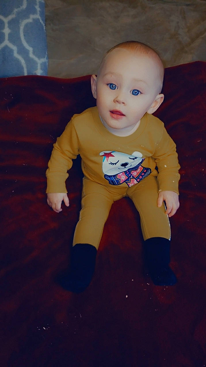 Alannah is registered to the contest to win money with this photo: abdomen, baby, baby_toddler_clothing, baby_toys, cheek, figurine, finger, joint, organ, person, sleeve, stomach, surprise, toy