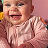 Della joined the competition — help win amazing prizes! baby, child, smiling, happy, blue_eyes, pink_clothing, ribbed_texture, hands, toy, indoor, portrait, closeup, cute, infant, person, skin, face, mouth, fingers, background