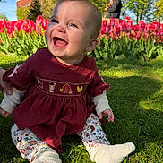Della joined the competition — help win amazing prizes! baby, child, smiling, grass, tulips, flowers, outdoor, sunlight, nature, park, person, dress, leggings, sock, tree, building, happy, portrait, spring, colorful