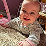 Della joined the competition — help win amazing prizes! baby, smiling, blue_eyes, carpet, crawling, indoor, child, cute, happy, person, clothing, long_sleeve, furniture, wooden_chair, pink_wall, hand, face, infant, portrait, floor