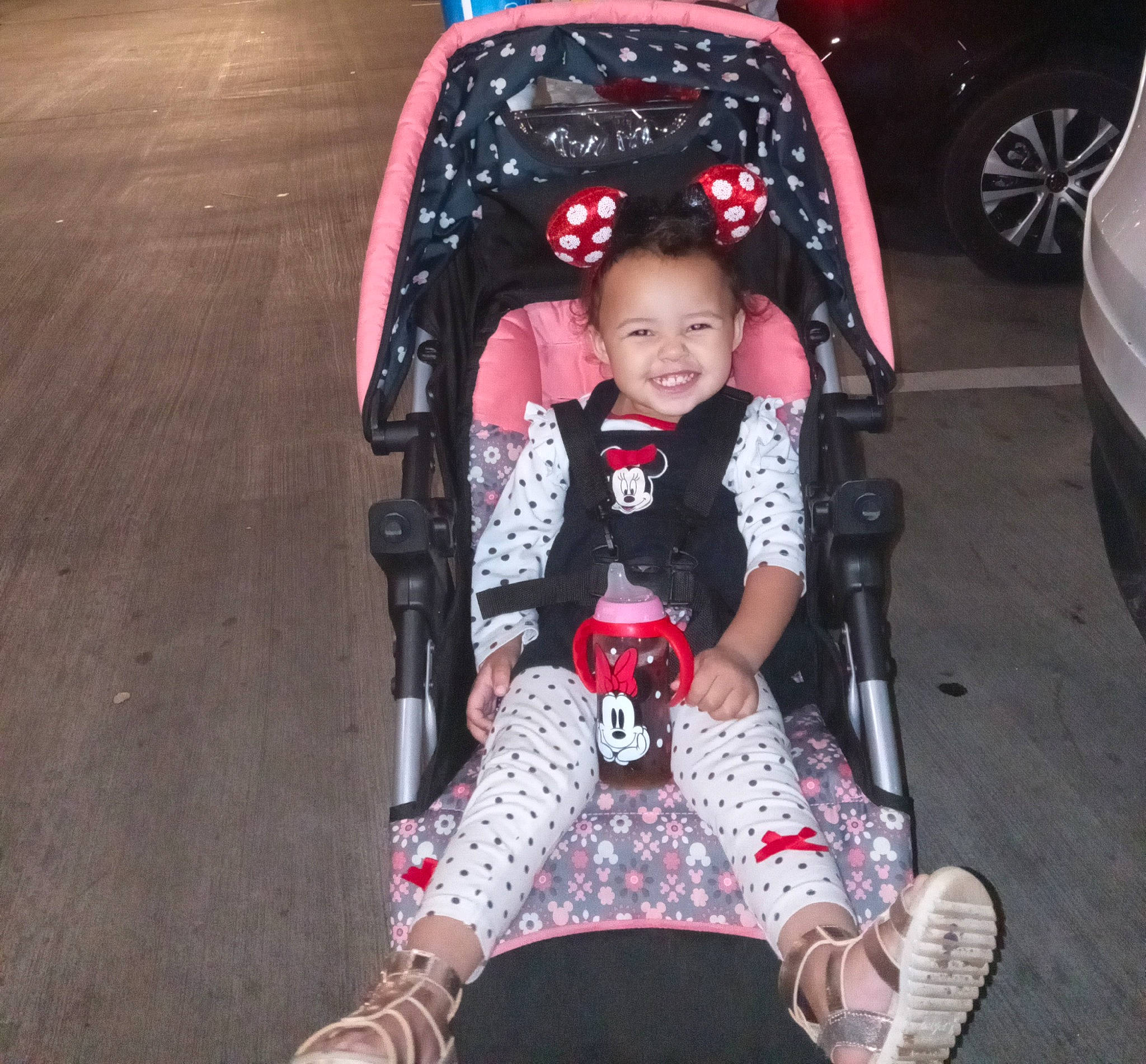 Journee joined the competition — help win amazing prizes! automotive_design, automotive_lighting, baby_carriage, baby_products, black, car, child, fun, joy, lap, motor_vehicle, person, photograph, pink, product, red, smile, tire, toddler, vehicle