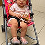 Journi joined the competition — help win amazing prizes! toddler, child, stroller, pink, minnie_mouse, shoes, sippy_cup, curly_hair, indoor, floor_tiles, serious_expression, clothing, baby, toy, person, footwear, seatbelt, wheelchair, plastic, cuteness