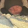 baby, sleeping, blanket, hat, cozy, infant, face, closeup, warm, soft, child, cute, resting, indoors, headwear, peaceful, bundle, comfort, portrait, newborn