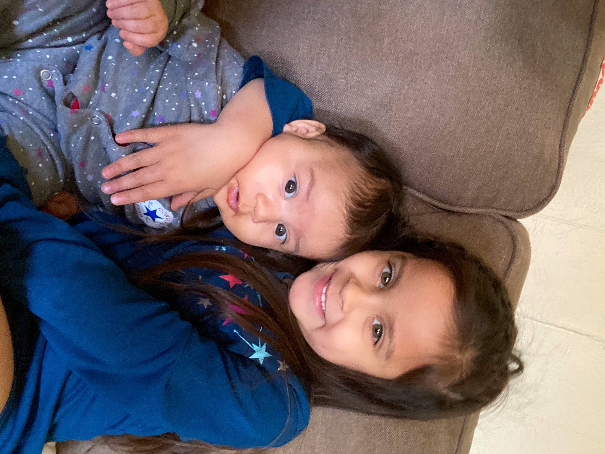 Genesis is registered to the contest to win money with this photo: arm, cheek, comfort, event, eye, face, facial_expression, fun, gesture, happy, iris, joy, lap, mouth, nose, organ, people, person, skin, smile