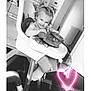 toddler, child, high_chair, toy, smiling, pigtails, indoor, black_and_white, neon_heart, floor, kitchen, radiator, doorway, furniture, happy, person, playful, cute, baby, seat