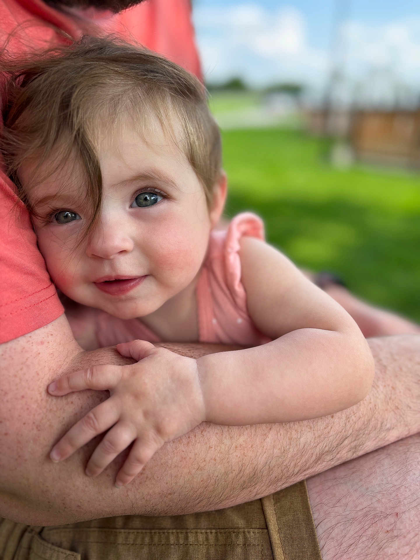 Vivienne Walter is registered to the contest to win money with this photo: baby, child, face, arms, skin, hair, outdoor, greenery, person, holding, hug, closeup, portrait, infant, cute, smile, toddler, human, warmth, comfort