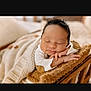 newborn, baby, sleeping, blanket, cushion, wooden_bed, cozy, soft, infant, peaceful, wrapped, knitted_blanket, cute, portrait, indoors, resting, tiny_hands, sleep, warm, peace