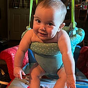 Everleigh joined the competition — help win amazing prizes! baby, smiling, indoor, baby_jumper, child, cute, infant, play, furniture, blanket, paw_patrol, footwear, happy, person, seat, toy, room, childhood, arms, legs