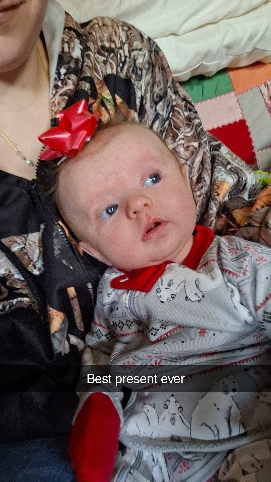 Elizabeth Anne is registered to the contest to win money with this photo: baby, baby_carriage, baby_products, baby_toddler_clothing, carmine, cheek, child, comfort, eye, fur, happy, iris, jewellery, lip, pattern, person, portrait_photography, red, sitting, skin