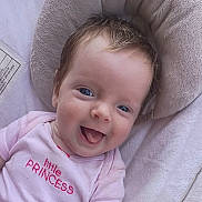 Rynlee joined the competition — help win amazing prizes! baby, child, smiling, blue_eyes, pink_clothing, tongue_out, soft_toys, plush, infant, cute, portrait, happy, indoors, baby_seat, close_up, human, face, head, toddler, cozy