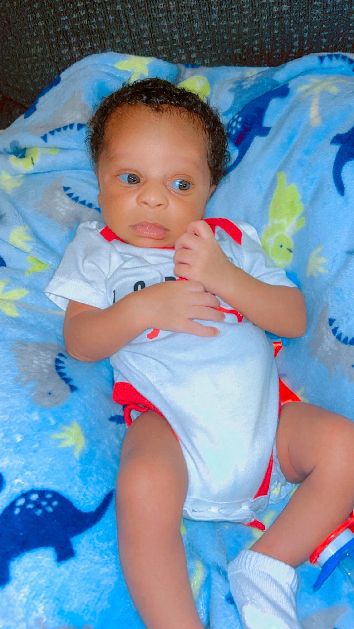 Jakauri is registered to the contest to win money with this photo: aqua, azure, baby, baby_toddler_clothing, blue, cheek, child, electric_blue, eye, finger, fun, happy, human_leg, iris, mouth, person, sitting, skin, textile, thigh