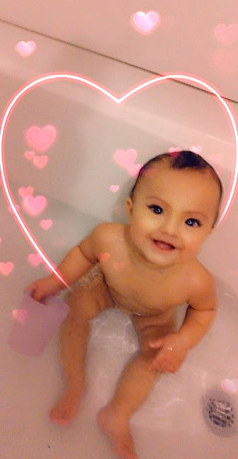Kamila Belén Zhinin Palma joined the competition — help win amazing prizes! baby, baby_bathing, bathing, bathtub, child, joy, person, pink, skin, smile, toddler