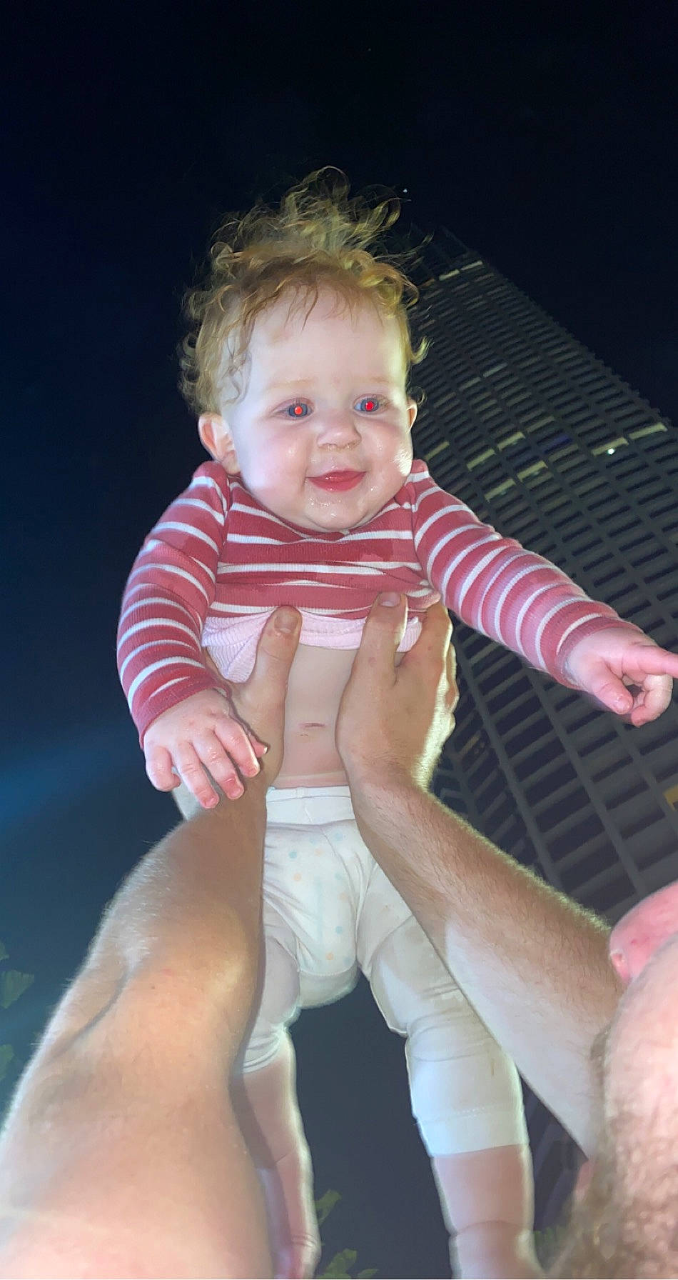 Laura is registered to the contest to win money with this photo: baby, baby_toddler_clothing, blond, cheek, child, comfort, elbow, finger, hand, joy, knee, lap, muscle, person, pink, product, sitting, skin, thigh, thumb