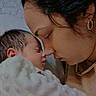 baby, newborn, mother, face, profile, skin, love, affection, bond, family, closeup, cuddle, blanket, indoor, warmth, portrait, sleeping, head, earring, necklace