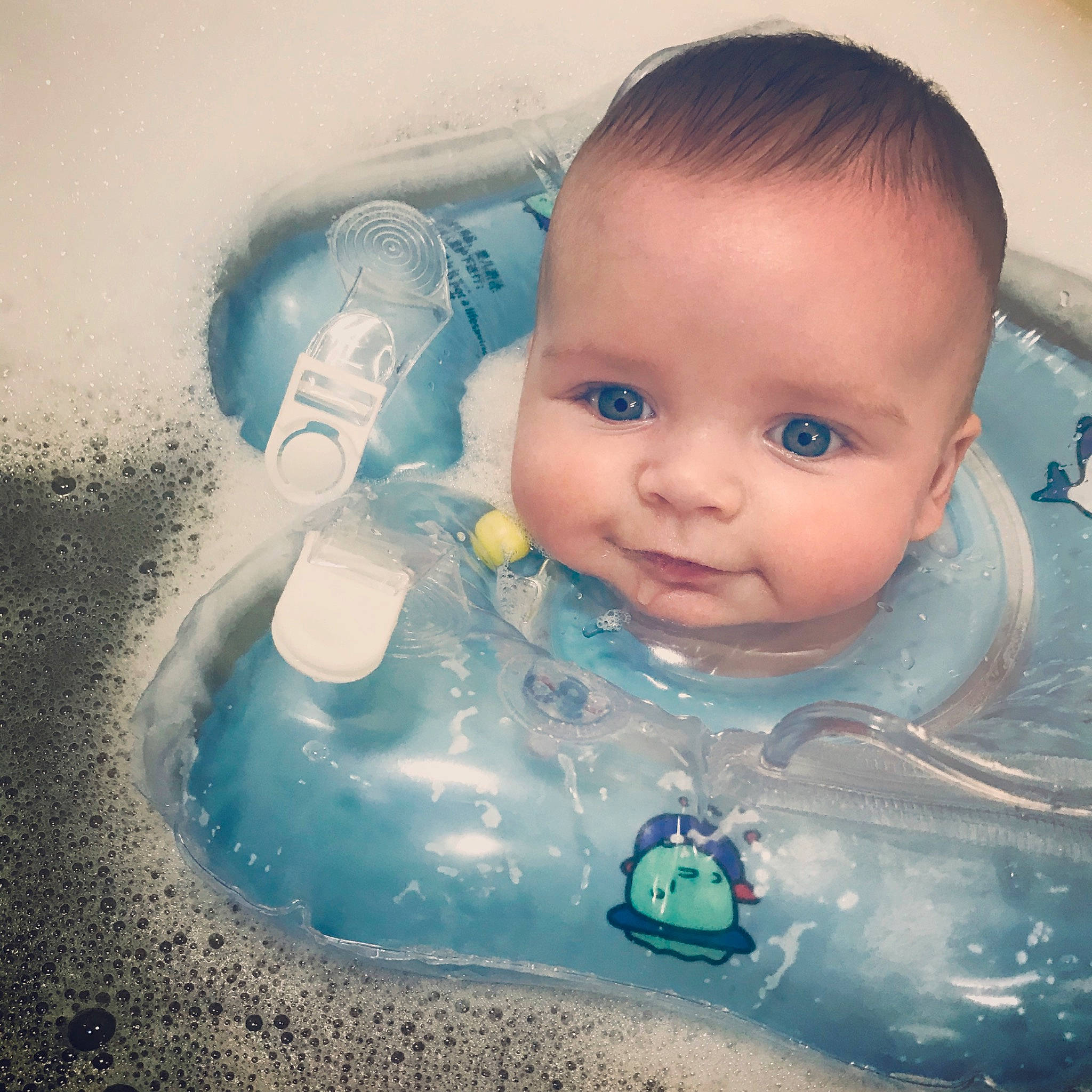 Coby is registered to the contest to win money with this photo: baby, baby_bathing, baby_products, bathing, bathtub, cheek, child, cool, eye, face, forehead, fun, head, nose, person, play, product, skin, smile, toddler