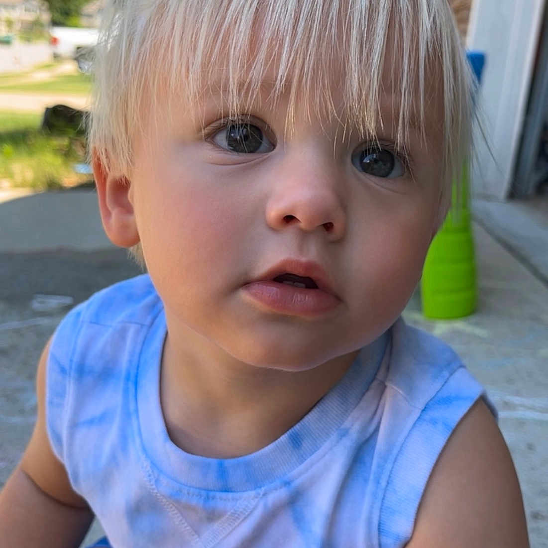 Graham joined the competition — help win amazing prizes! baby, blonde, bodypart, city, clothing, face, finger, frown, grass, hair, hand, head, person, photography, plant, portrait, pottedplant, road, sad, t_shirt