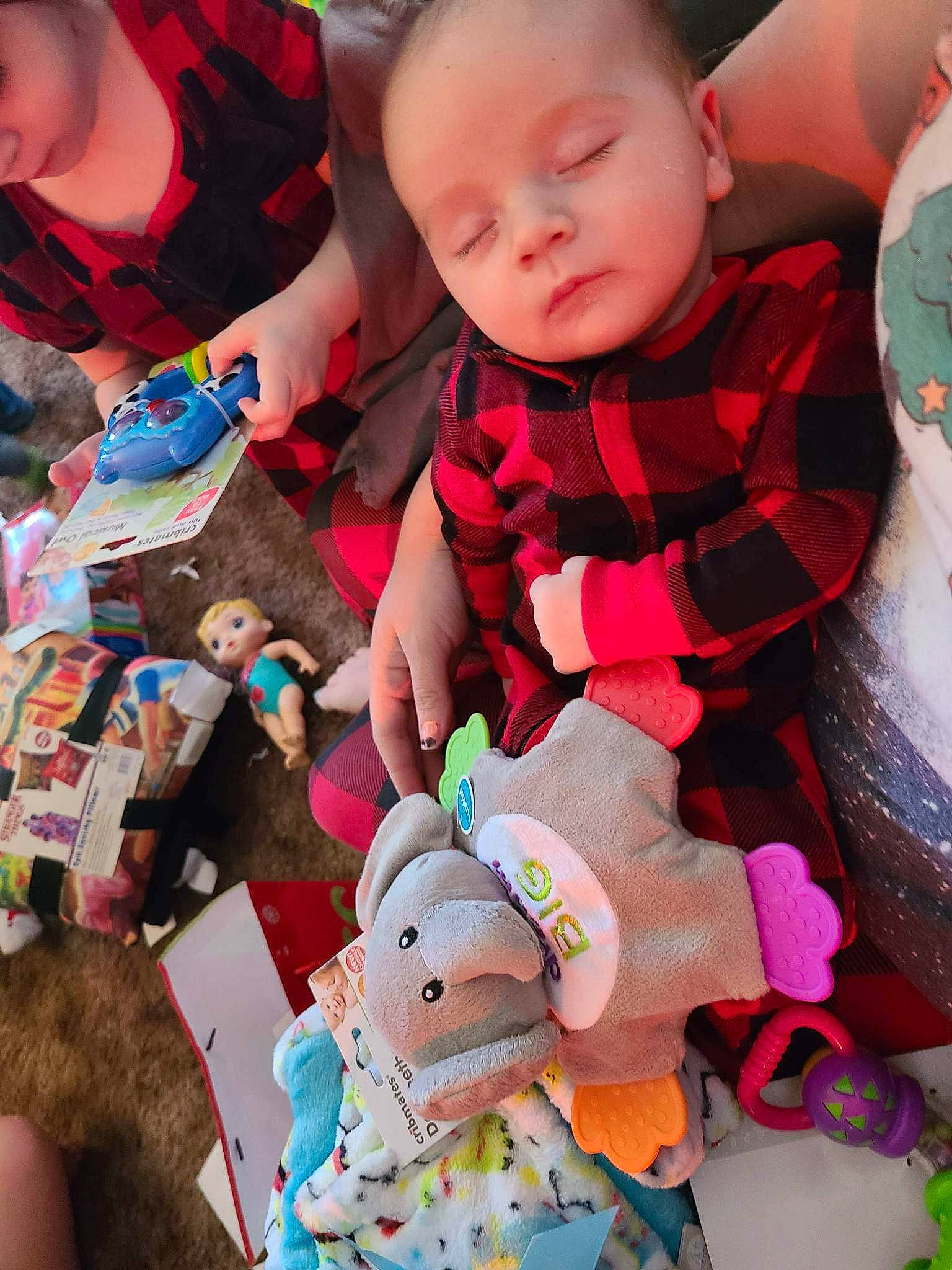 Kelly is registered to the contest to win money with this photo: baby, baby_products, baby_toddler_clothing, child, doll, event, face, fun, happy, head, people, person, photograph, pink, product, skin, sleeve, snapshot, textile, toddler