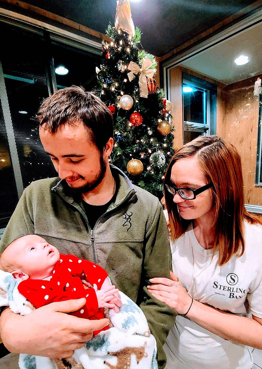 Kelly joined the competition — help win amazing prizes! baby, child, christmas, christmas_decoration, christmas_eve, christmas_ornament, christmas_tree, conifer, event, eyewear, fun, happy, holiday, holiday_ornament, lap, ornament, person, sunglasses, toddler, tradition