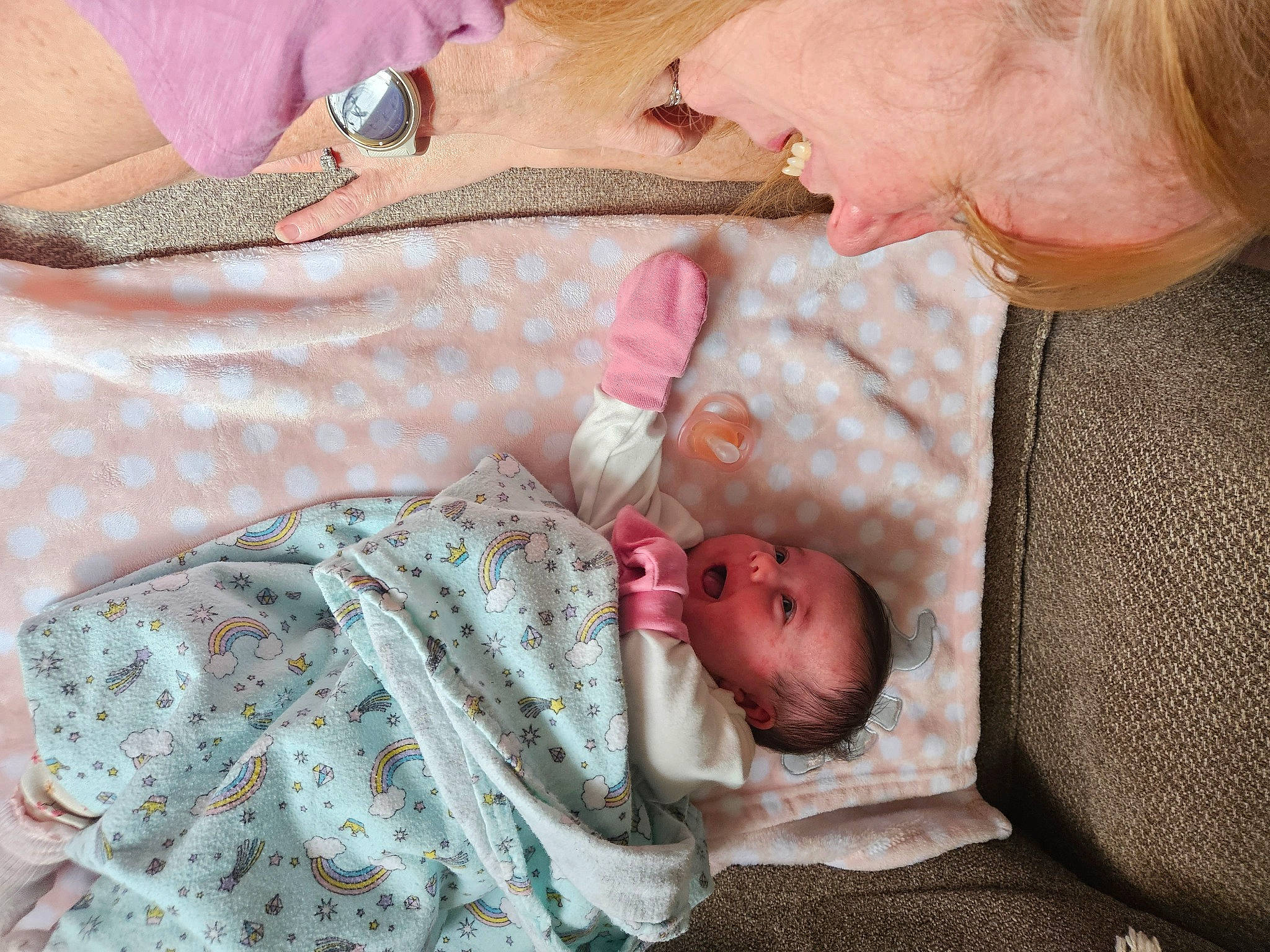 Lila is registered to the contest to win money with this photo: baby, baby_products, baby_toddler_clothing, bedding, bedtime, child, comfort, gesture, hand, linens, pattern, peach, person, pink, product, room, skin, sleep, sleeve, toddler