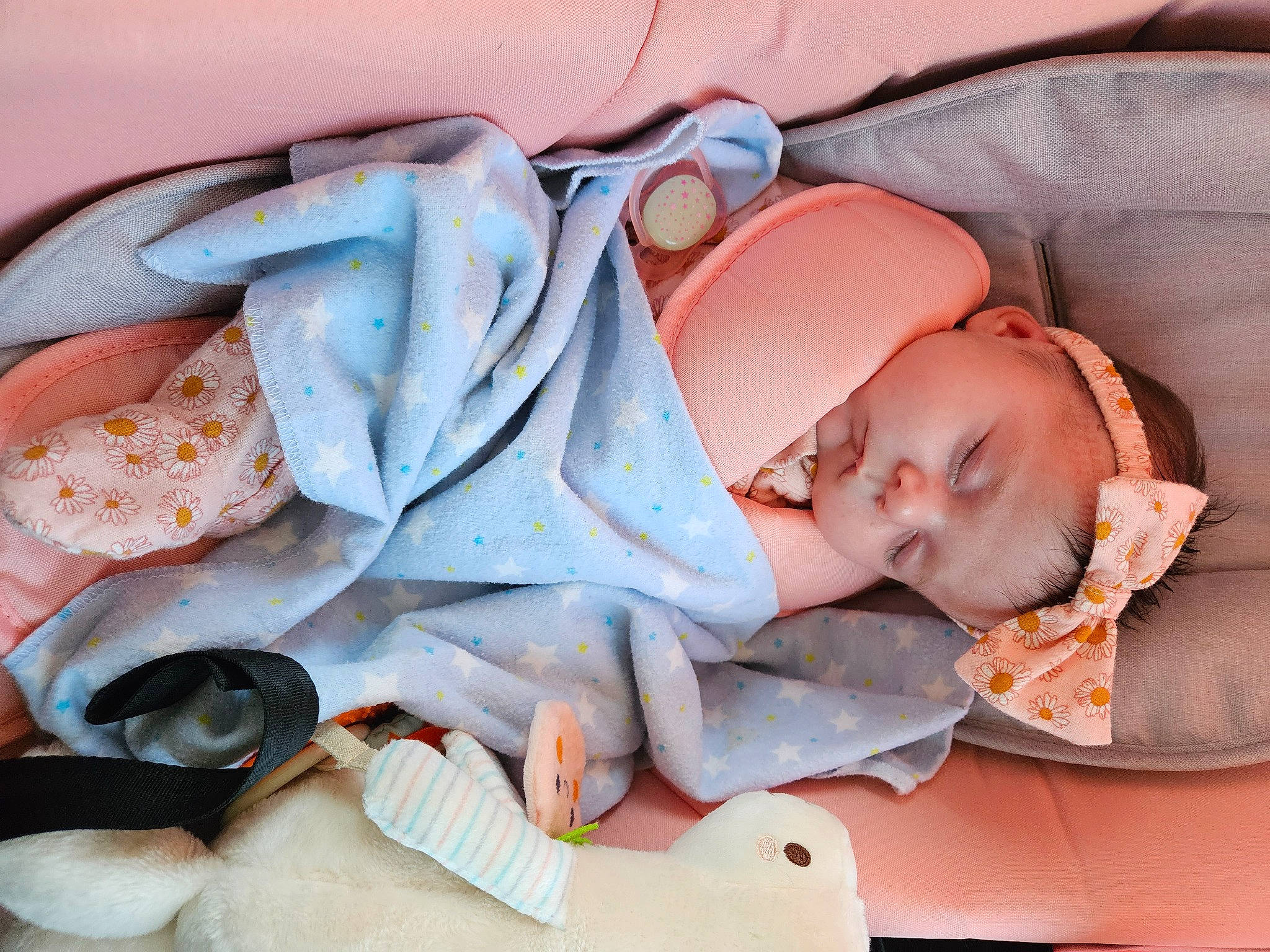 Lila joined the competition — help win amazing prizes! baby, baby_products, baby_sleeping, baby_toddler_clothing, bedtime, child, comfort, linens, nap, orange, pattern, peach, person, room, rose, sitting, skin, sleep, textile, toddler