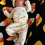 Jasmine joined the competition — help win amazing prizes! baby, sleeping, infant, blanket, candy_corn, pattern, cozy, cute, clothing, white_outfit, strawberry_print, footwear, headwear, soft_texture, lying_down, peaceful, indoors, child, newborn, resting