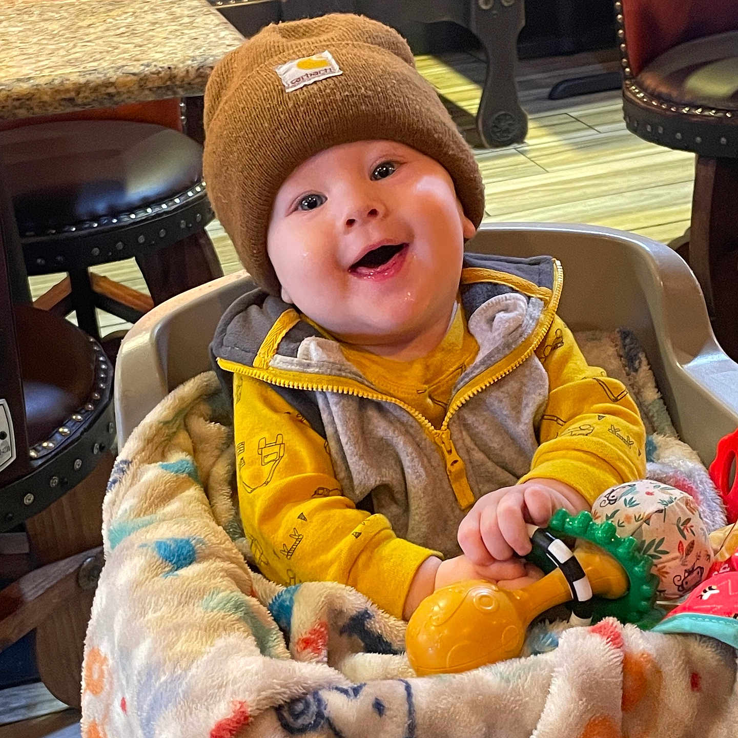 Michael is registered to the contest to win money with this photo: accessories, architecture, baby, babylaughing, ball, baseballcap, basket, beanie, blanket, bodypart, bonnet, building, cap, chair, citrusfruit, city, clothing, coat, costume, couch