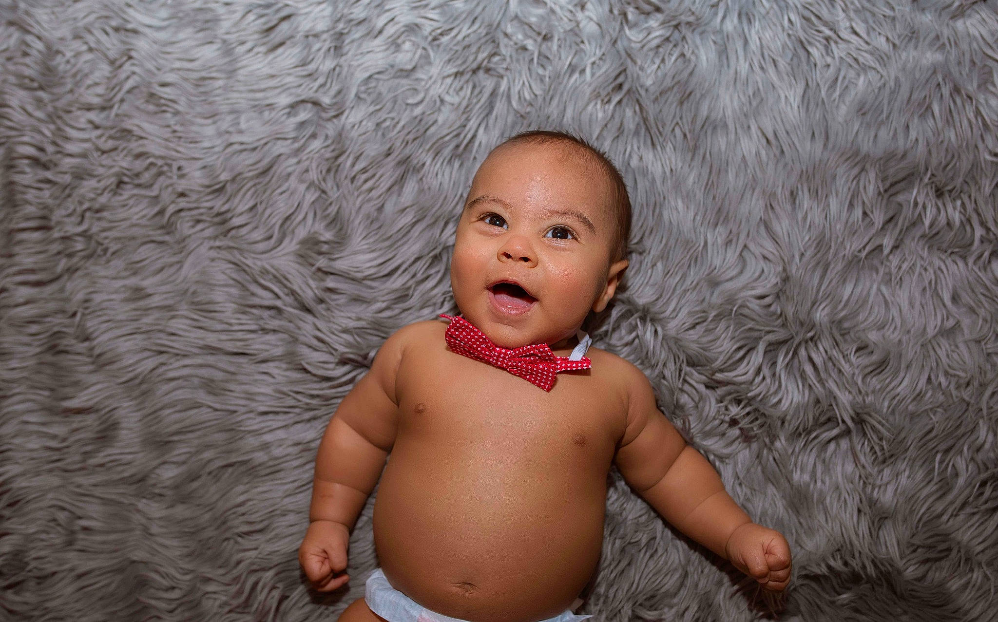 Zavian is registered to the contest to win money with this photo: baby, cheek, child, face, fun, head, lip, mouth, muscle, nose, person, pink, skin, smile, toddler, trunk