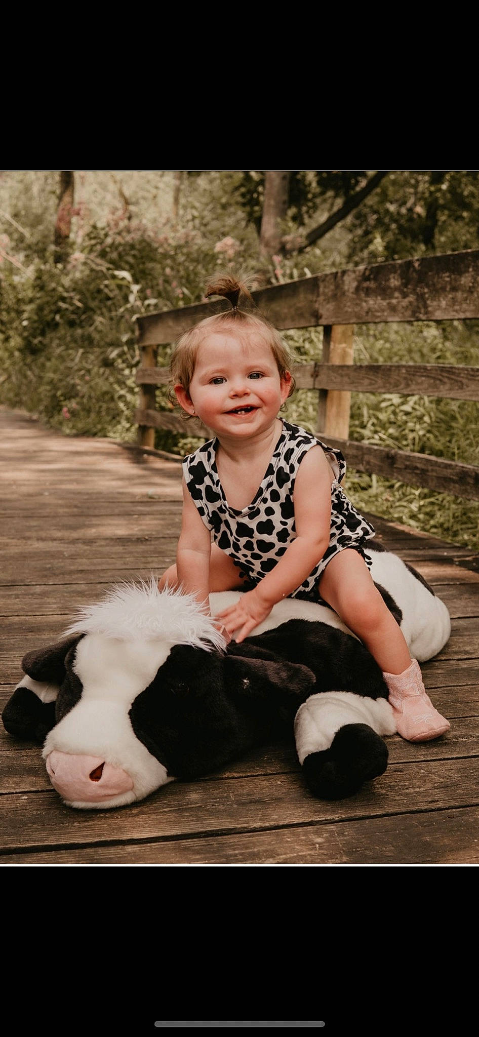 Briley is registered to the contest to win money with this photo: baby_toddler_clothing, child, companion_dog, eye, flash_photography, fun, grass, hairstyle, happy, human_leg, joy, leg, leisure, people_in_nature, person, plant, smile, standing, t_shirt, toddler