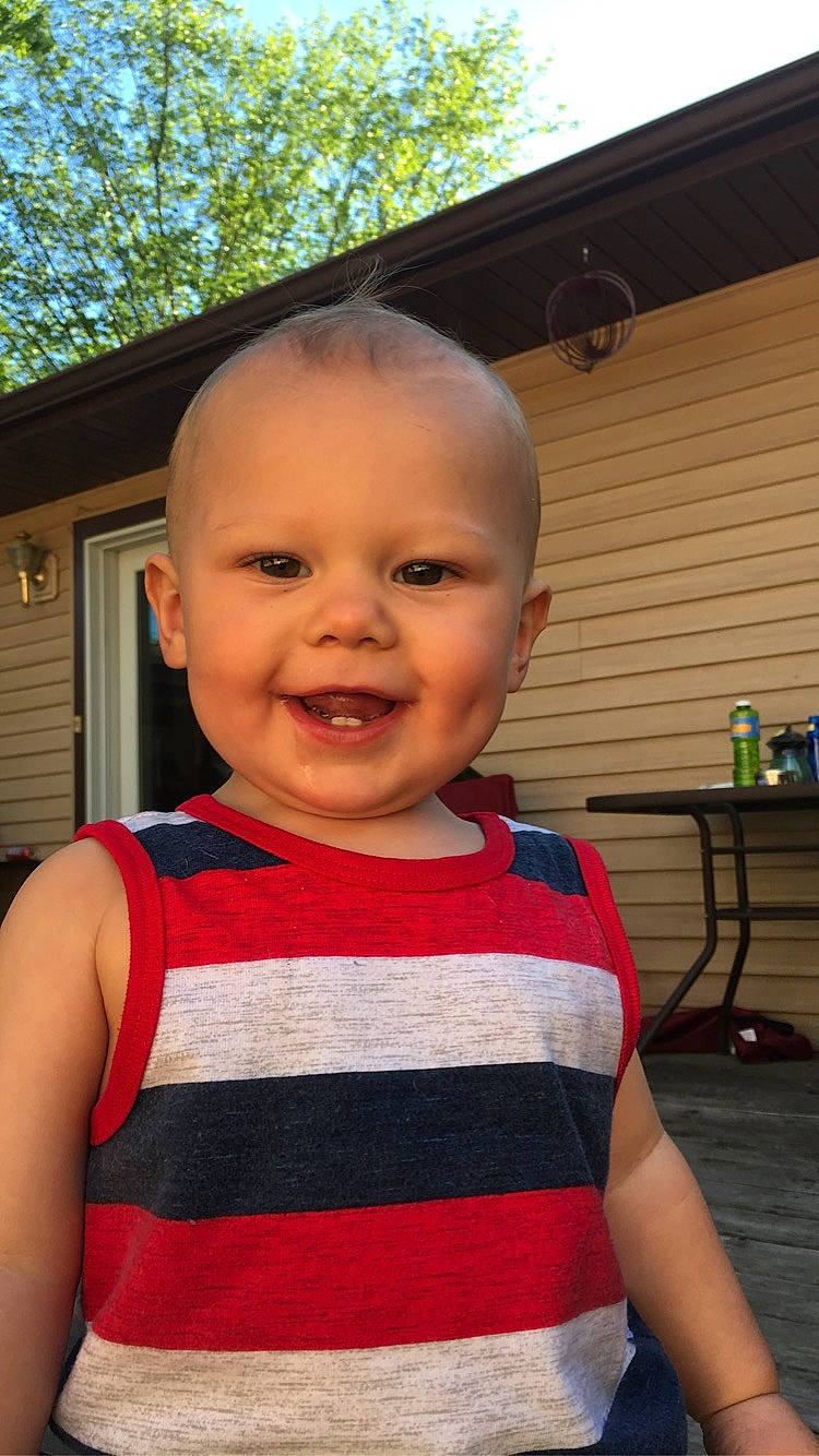 Ayden joined the competition — help win amazing prizes! baby, cheek, child, chin, face, facial_expression, forehead, head, joy, laugh, outerwear, people, person, red, skin, smile, standing, summer, toddler, tooth