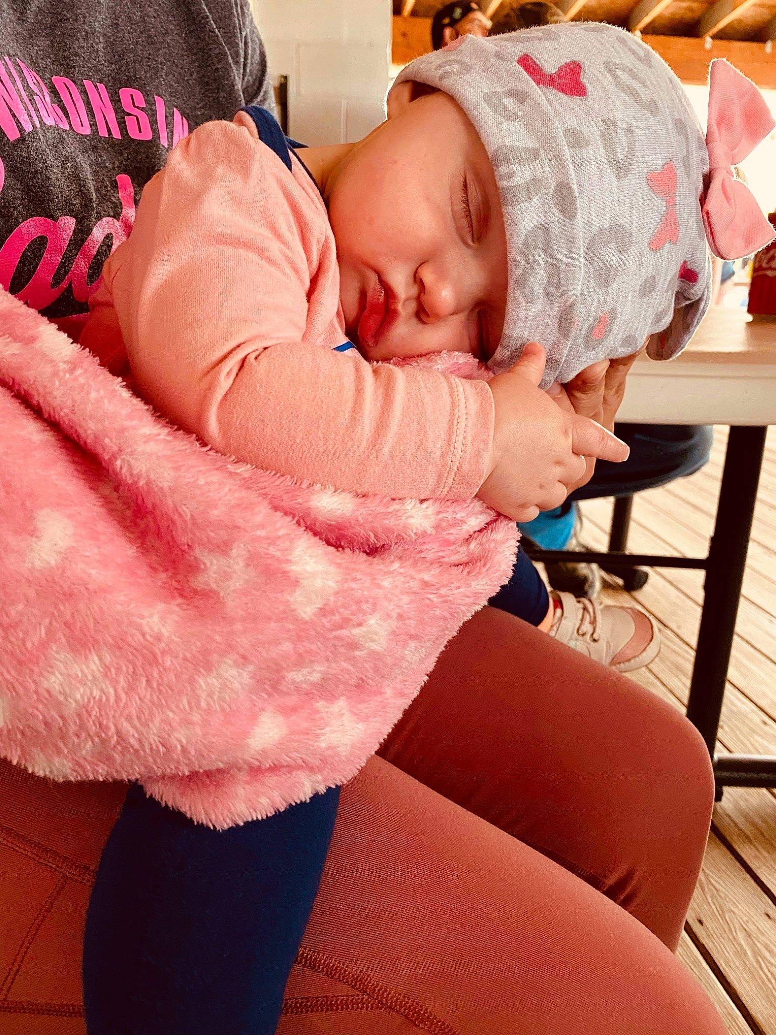 Daphne is registered to the contest to win money with this photo: baby, baby_products, baby_safety, baby_sleeping, baby_toddler_clothing, car_seat, chair, child, comfort, headwear, knee, linens, magenta, nail, nap, person, room, sitting, sleeve, table