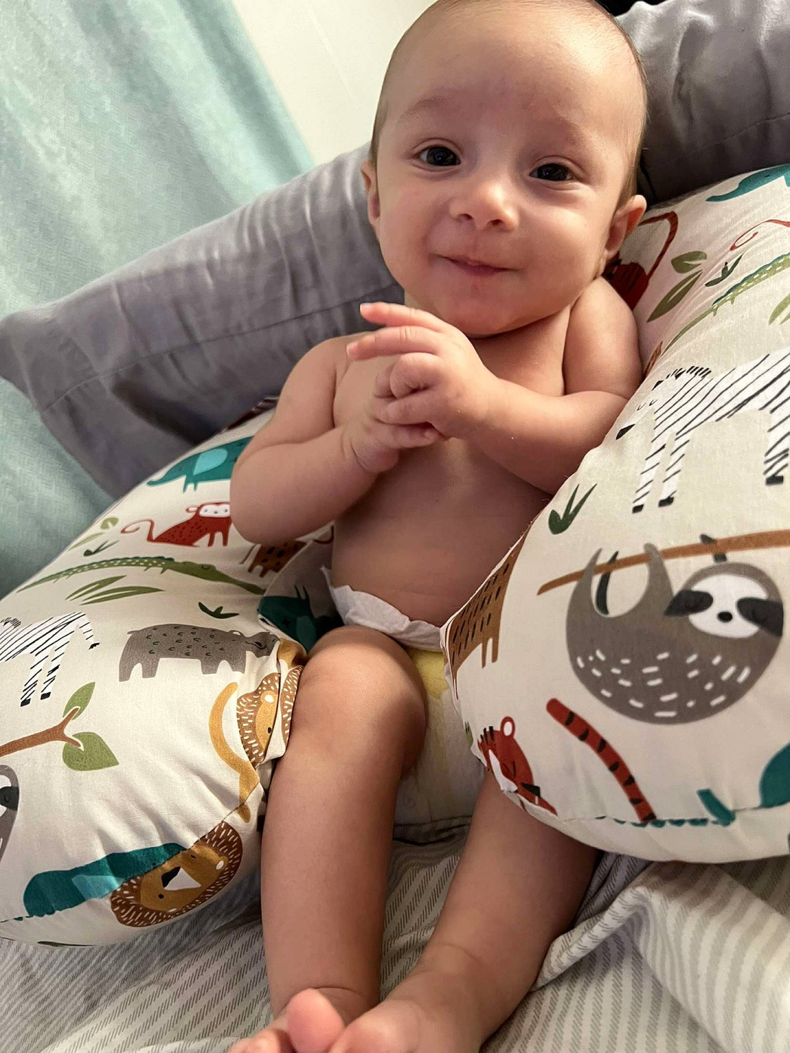 Kyran is registered to the contest to win money with this photo: baby_toddler_clothing, cheek, chin, comfort, eye, face, facial_expression, hairstyle, hand, happy, head, human_body, joint, mouth, muscle, person, product, skin, smile, stomach