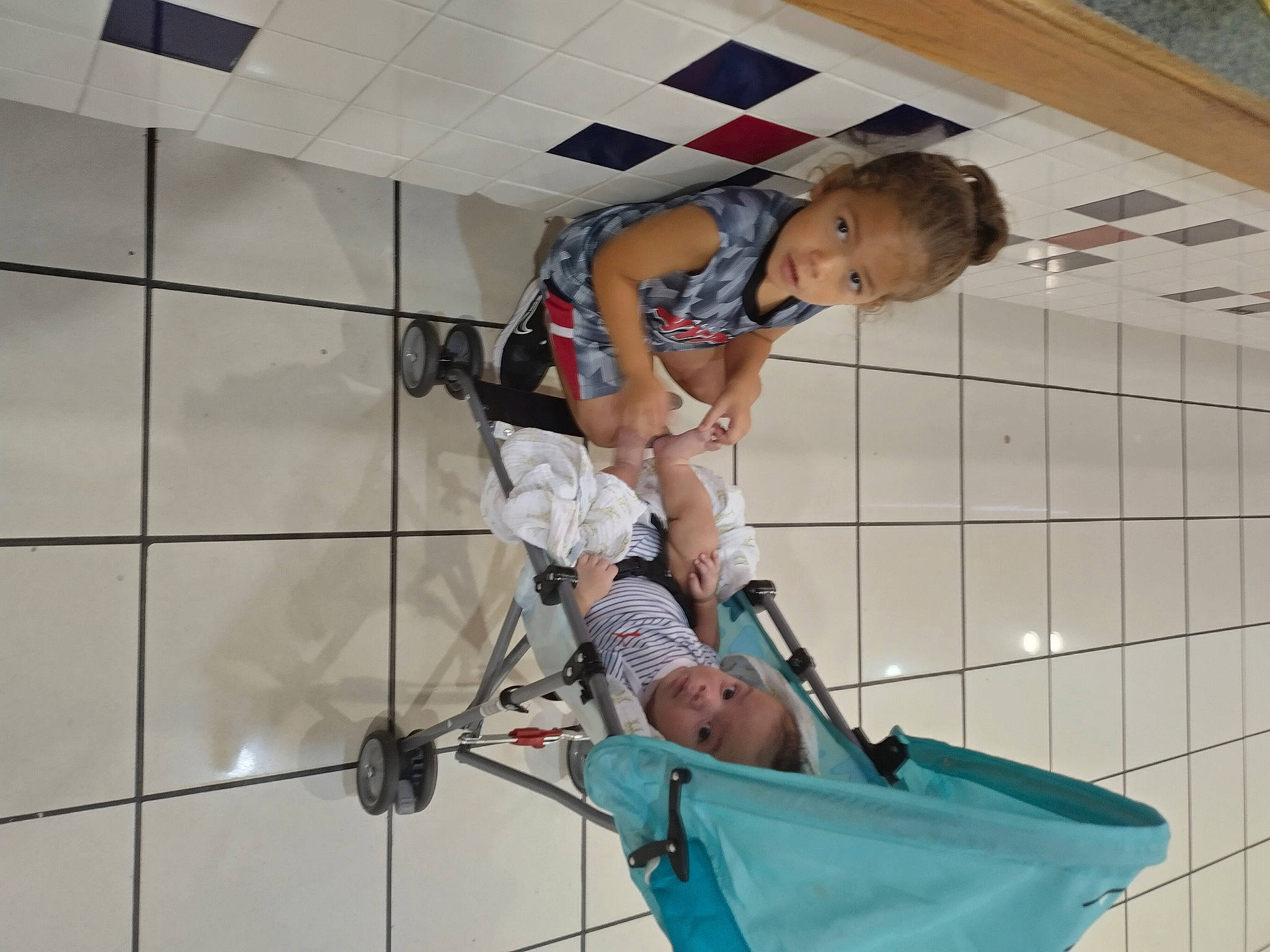 Liam is registered to the contest to win money with this photo: adventure, baby_products, ceiling, child, elbow, fun, knee, leg, leisure, person, recreation, room, rope, shorts, thigh, toddler